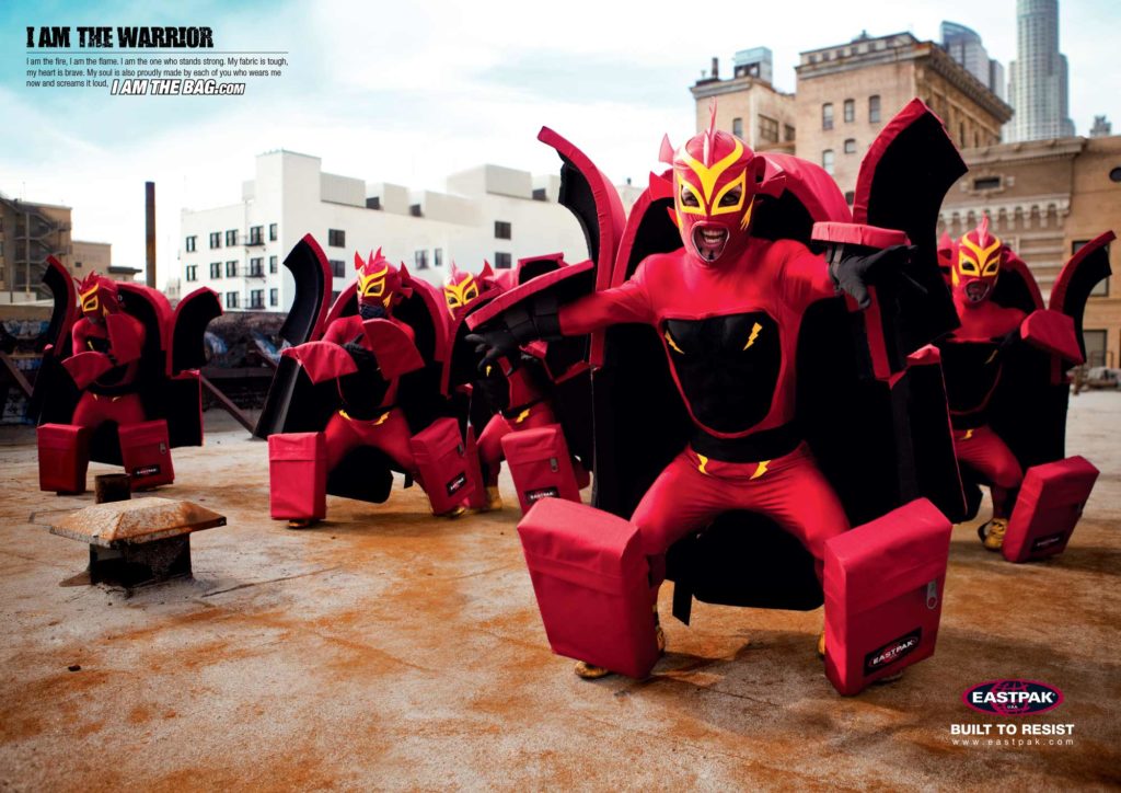 Dwarf warriors on a rooftop showing off their moves disguised as an Eastpak bag